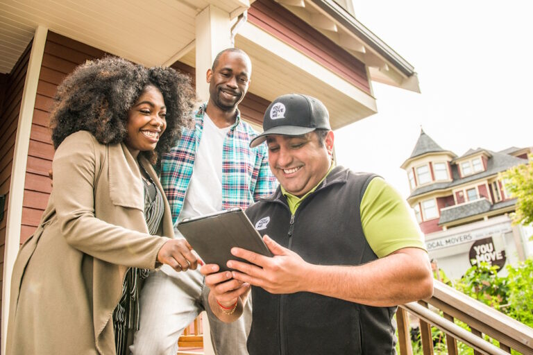 happy couple getting moving estimate